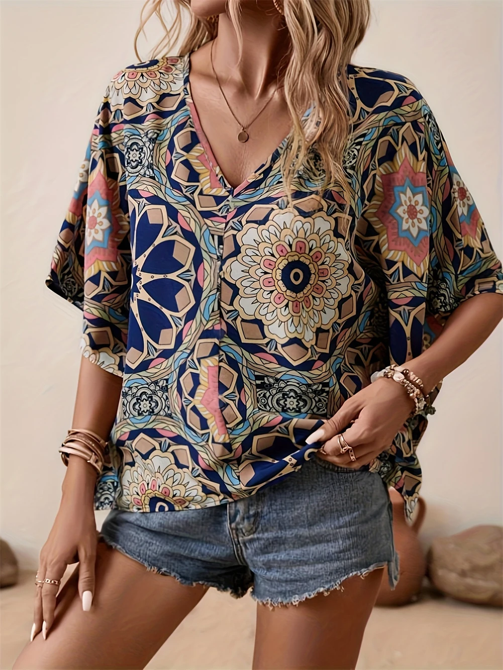 

Women's Printed V -Neck Split Half Sleeve Blouse