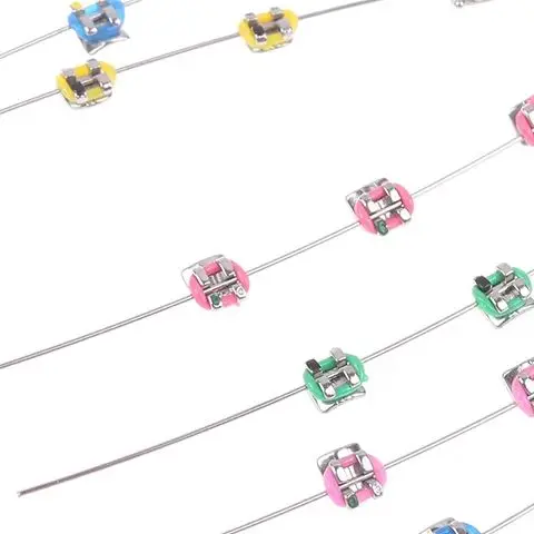 

2Pcs Split Type Mini Colorful Brackets With Hook Dental Fake Braces Temporary Tooth Decoration Dental Tool