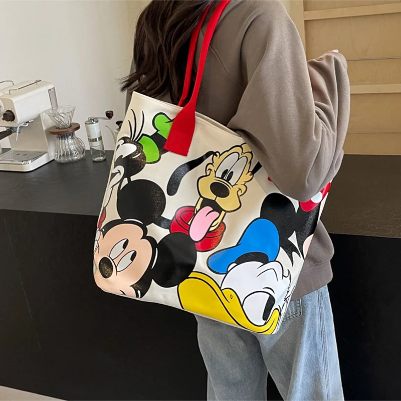 Disney Kawaii Mickey Mouse stampa Donald Duck borsa a tracolla in tela di grande capacità borsa per studenti per il tempo libero All-Match