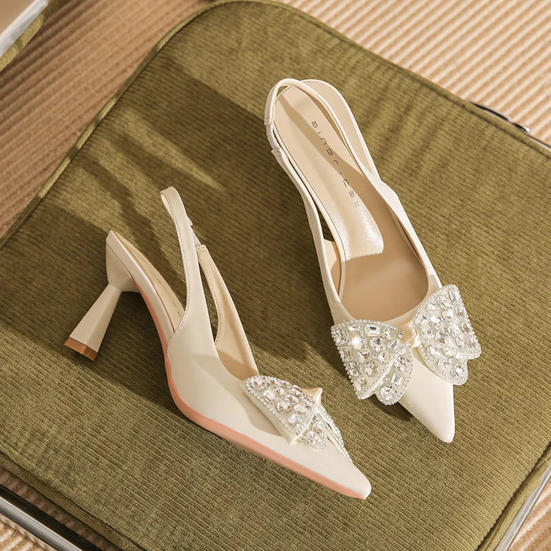 

Pointed high heels for women in 2024, new style baotou rhinestone bow back hollow slim heel sandals