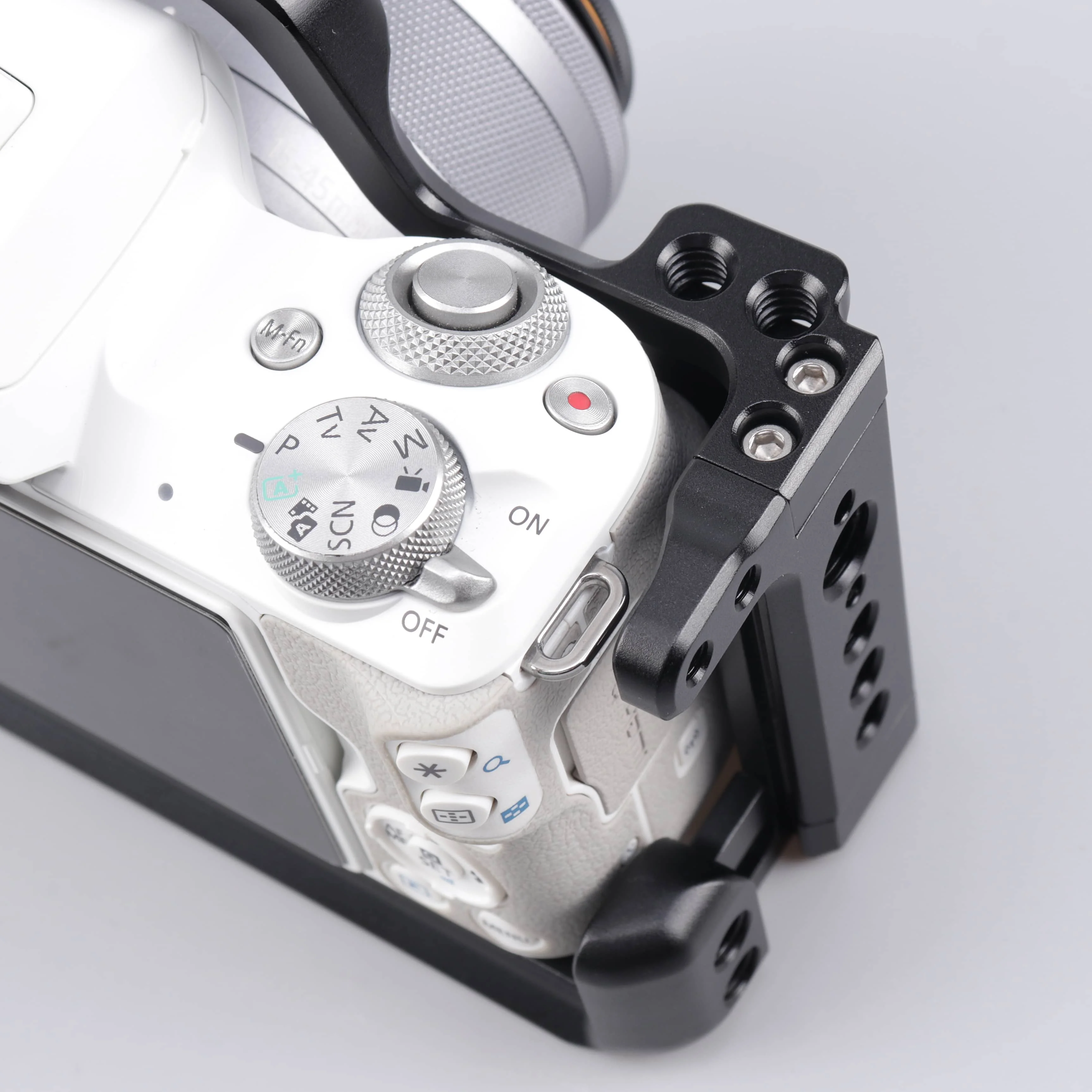 Gabbia per fotocamera DSLR professionale per Canon EOS M5 M50 M50II custodia protettiva per fotocamera cornice di estensione adatta a testa a sfera con morsetto svizzero Arca