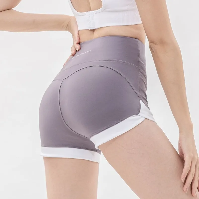 Pantaloncini a vita alta elastici per yoga attillati fitness a vita alta estivi da donna con colori a contrasto