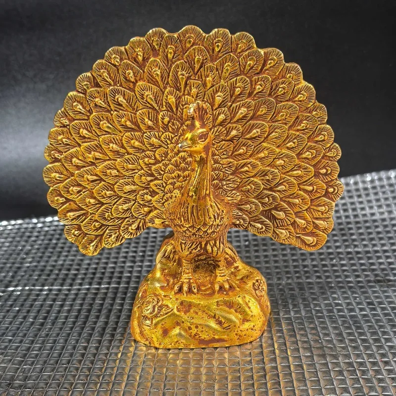 Antique-style, distressed brass peacock figurine with gilded details, a decorative piece for the home, a copper peacock animal o