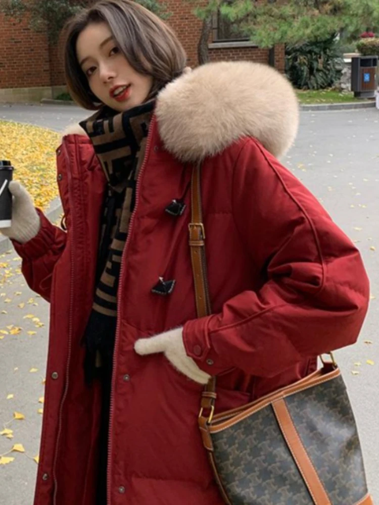 سترة قطن عادية لخريف وشتاء 2025 النسخة الكورية كبيرة بياقة من الفرو مع قلنسوة سترات دافئة فضفاضة فوق الركبة معطف قطني #2