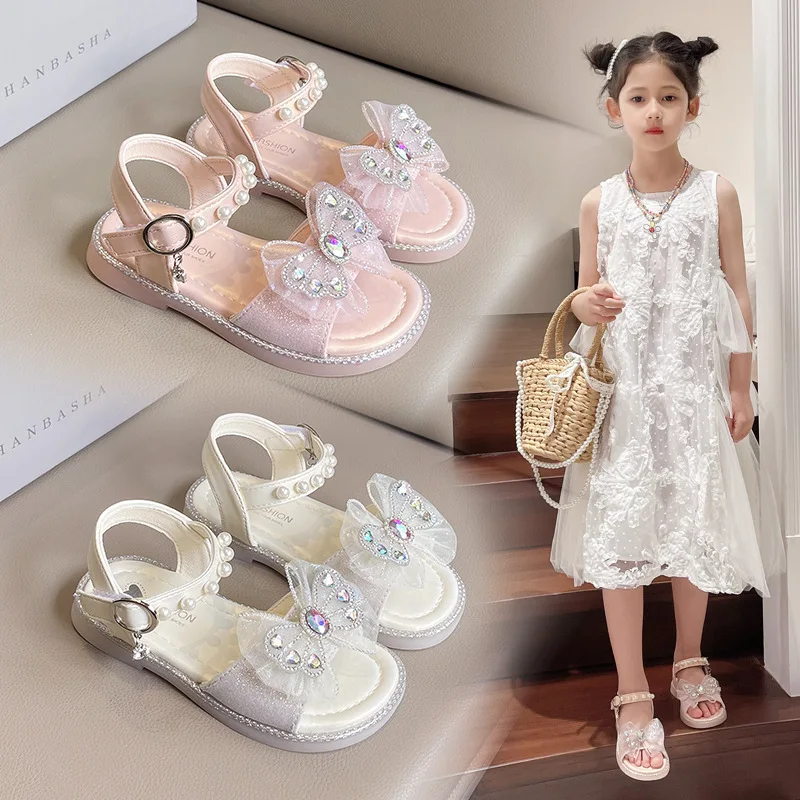 

2025 Children's Sandals for Girls Shoes for Kids Fashion Crystal Bow Tie Summer Soft Flat Heels Beach Princess Pearl Shoes Child