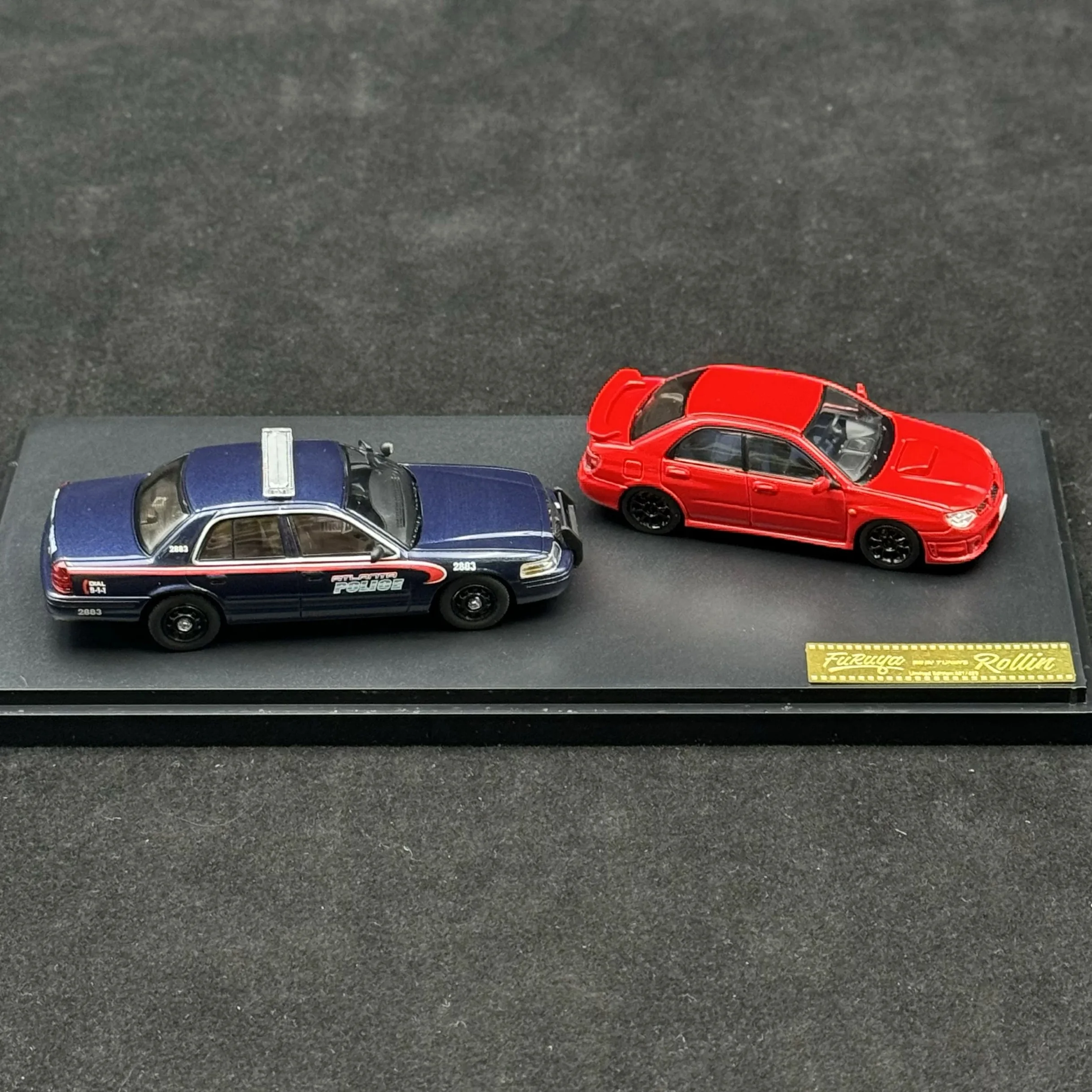 Rollin 1:64 Ford CV Extreme Thief WRX STI GD alloy two-car set model