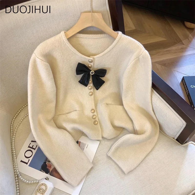 DUOJIHUI dolce Basic o-collo Chic Bow donna Cardigan autunno nuovo elegante semplice Casual tinta unita moda bottone Cardigan femminile