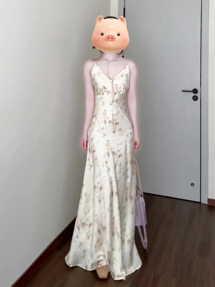 กระโปรงยาวลายดอกไม้สไตล์เกาหลีสำหรับผู้หญิง รุ่นใหม่ประจำฤดูร้อนปี 2025 เอวสูง ใส่สบาย นุ่ม เบาสบาย เหมาะสำหรับใส่ไปเที่ยวทะเล