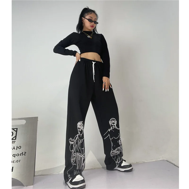 ربيع 2025 الهيب هوب شارع الجاز الرياضة الأوروبية والأمريكية مستقيم ins سراويل تقليدية النحت الأسود بنطلون المرأة
