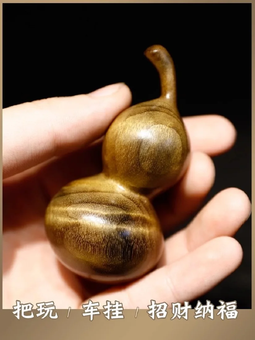 

Golden Silk Nan Wooden Carved Small Gourd Hand Twisted Play Purple Skin Boutique Solid Wood Sandalwood Car Hanging Crafts