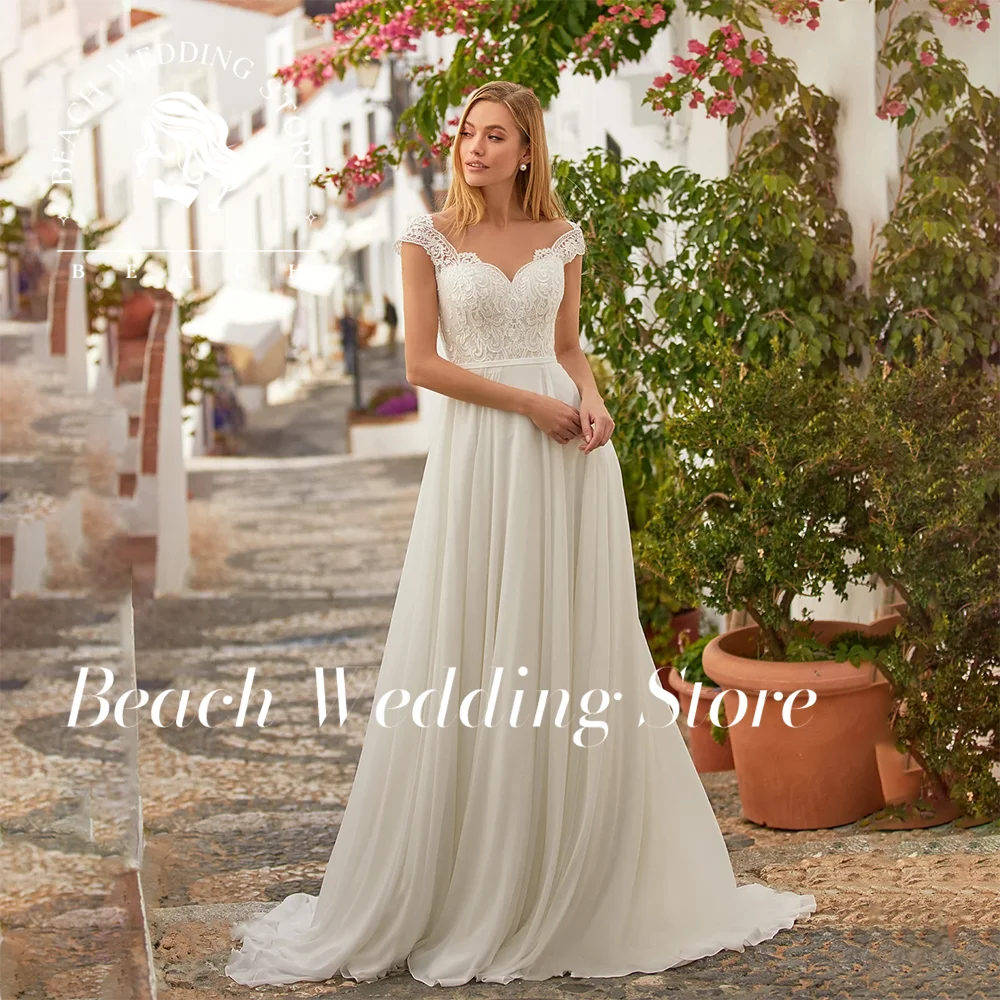 

Beach Customized Off Shoulder Cap Sleeve Lace Applique Chiffon Wedding Dress 2025 Open Back Train A Line Silhouette Bridal Gown