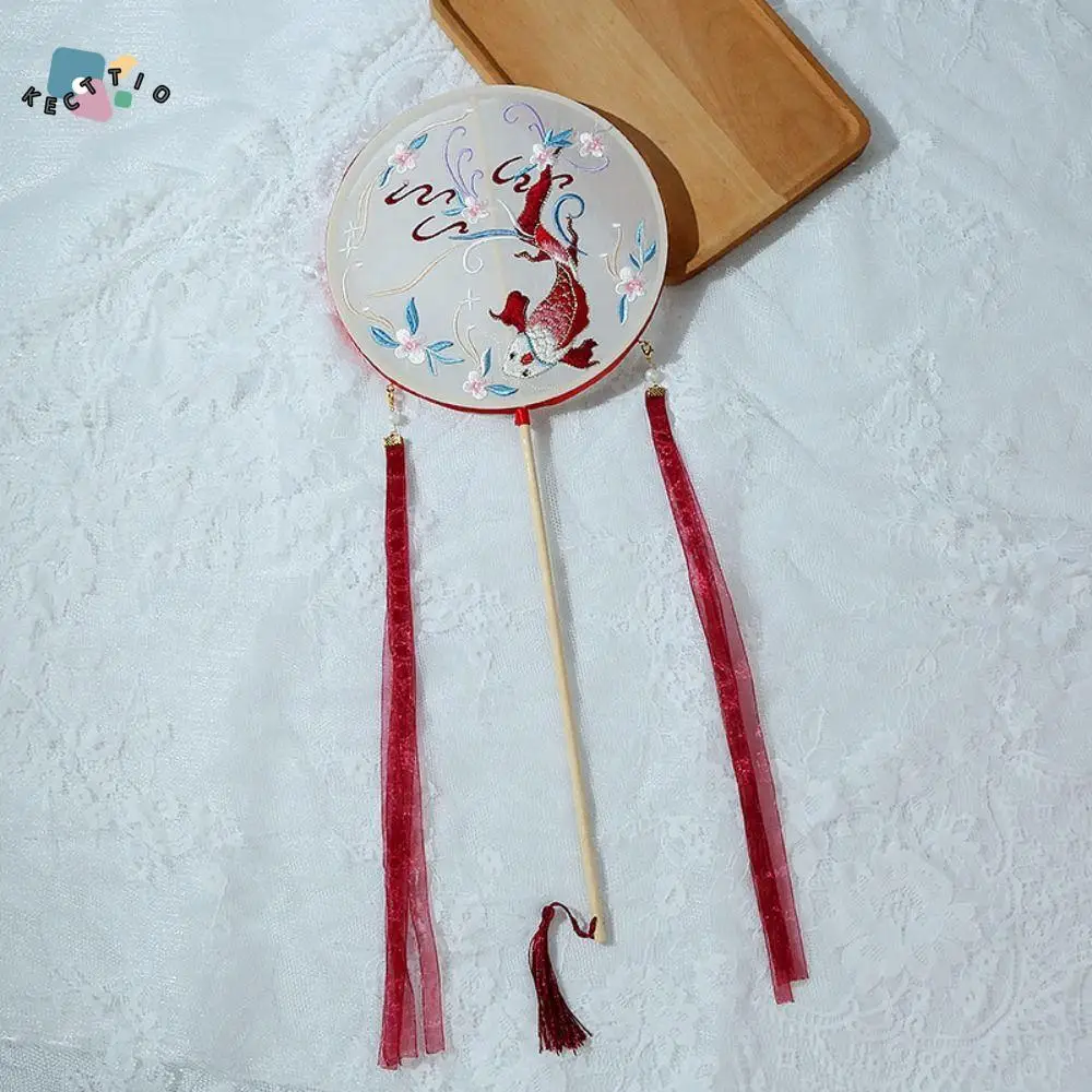 

Classical Chinese Style Round Fan Vintage Semi-transparent Long Handle Silk Fan Embroidered With Tassel Hanfu Hand Fan