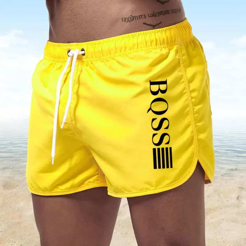 

New summer fast-drying swimming shorts for men and women, breathable surfing beach shorts, and men's fitness jogging shorts