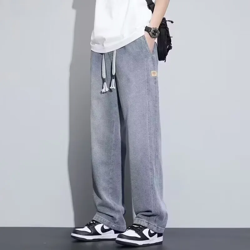 

Новые летние тонкие джинсы, свободные прямые мужские молодежные повседневные длинные брюки, модные брендовые износостойкие классические американские брюки