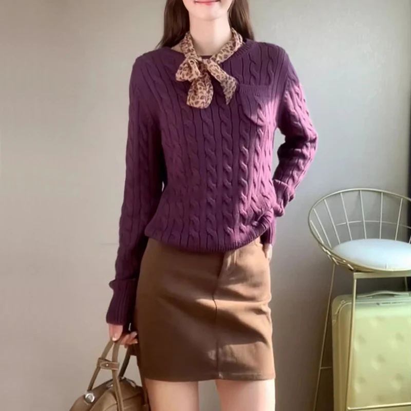 

Женский вязаный джемпер свободного кроя с карманами