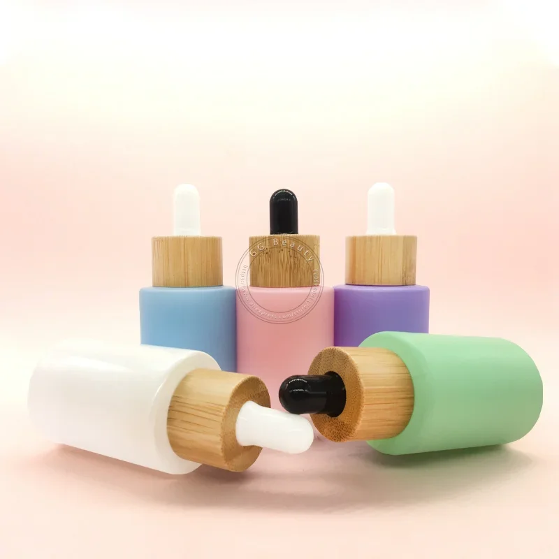 

Colored Frosted Glass Bottles with Bamboo Dropper Cap Luxury Liquid Container For Make Up And Skin CareRefillableTravelcontainer