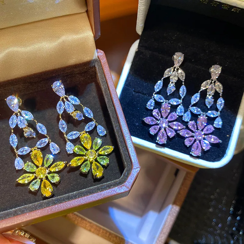 

Роскошные новые длинные изысканные серьги с кисточками из циркона