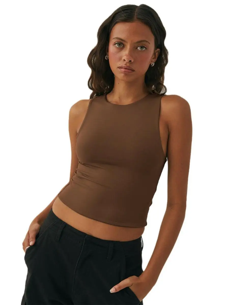 توب نسائي مثير بتصميم Y2K، قصير وضيق بدون أكمام، برقبة مستديرة، ملابس خارجية قصيرة بلون موحد مصنوعة من ألياف ثلاثية الأسيتات