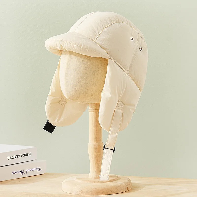 Рисунок 6 - Модные зимние теплые шапки-бомберы