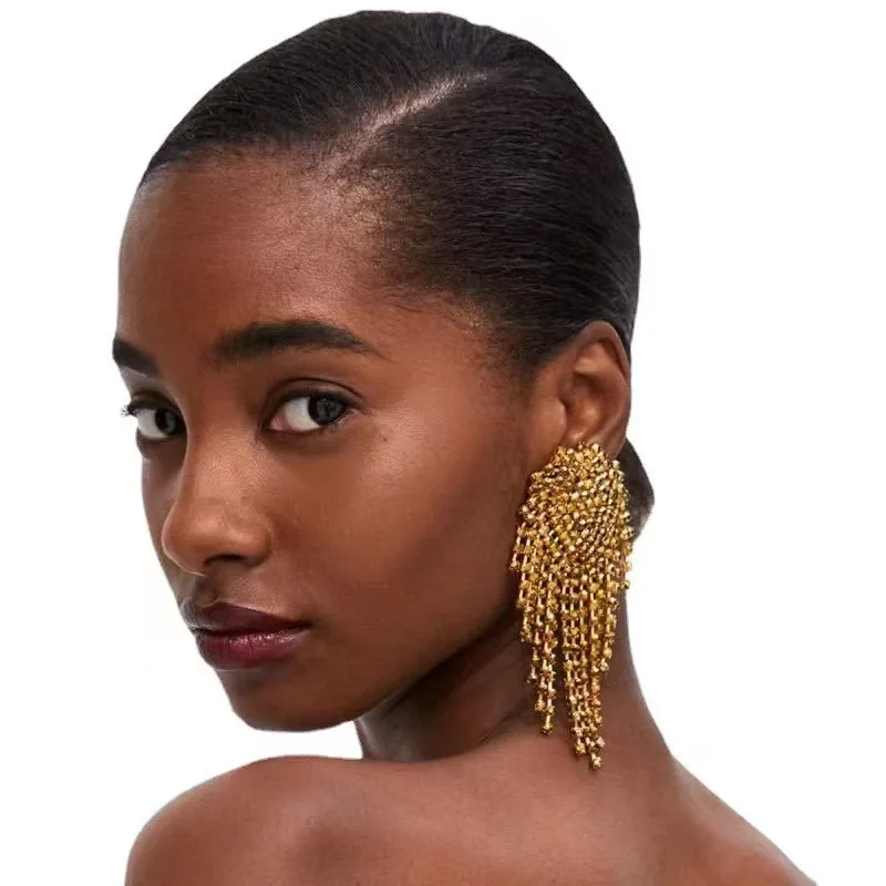 Hot Selling Water Droplet Shaped Hollow Tassel Chain Retro Earrings for Female Actors with Elegant Temperament and High-End Jewe