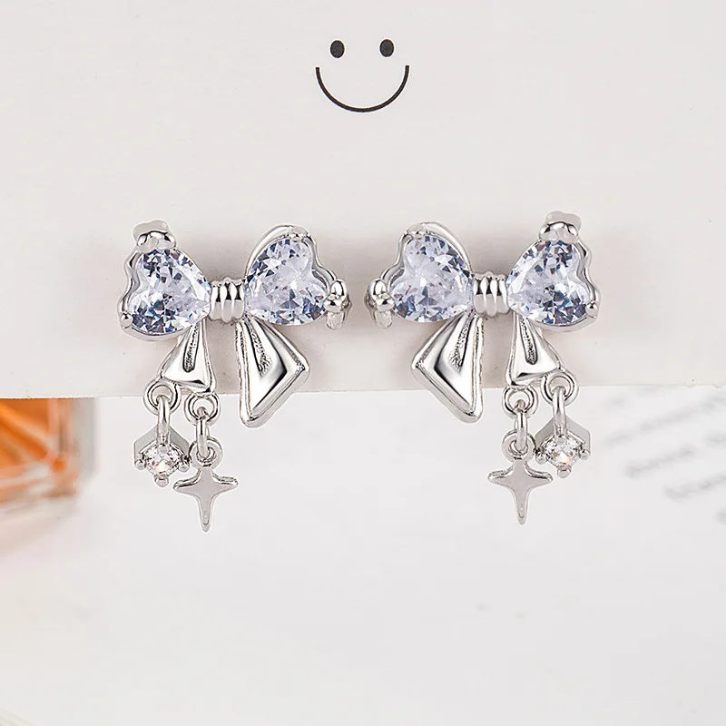 New Millennium Bow zircon stud earrings for women, fashionable Korean pink crystal personalized earrings and jewelry