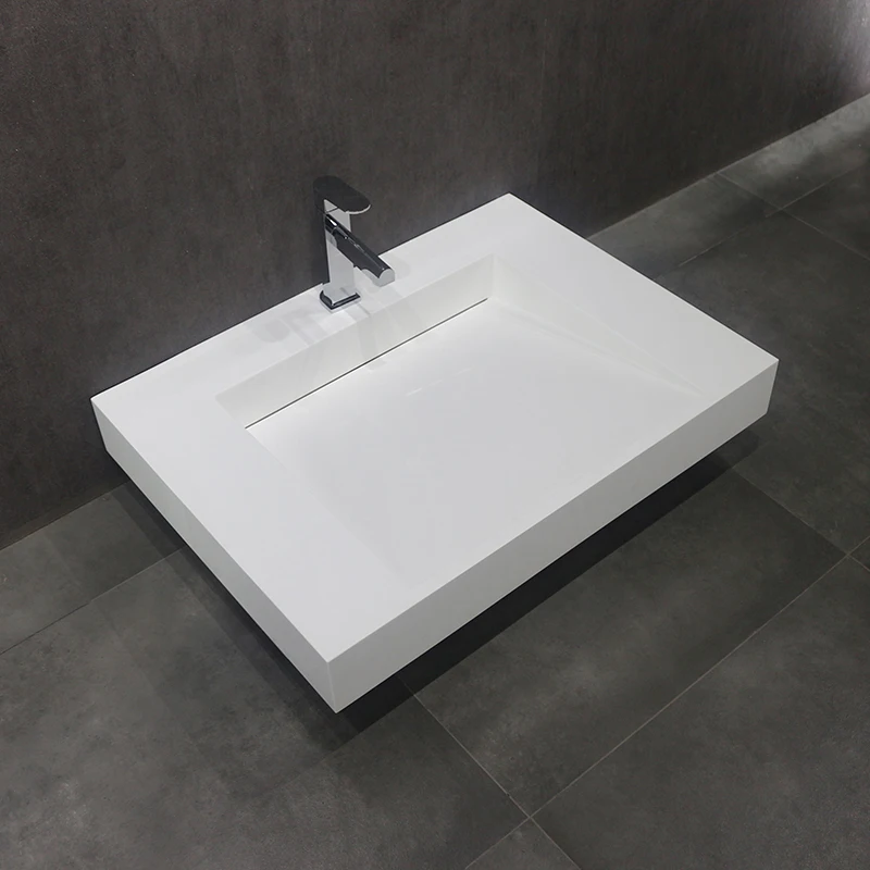 Man Made Stone Solid Surface Seamless Joint Wall Hung Wash Basin in White Color
