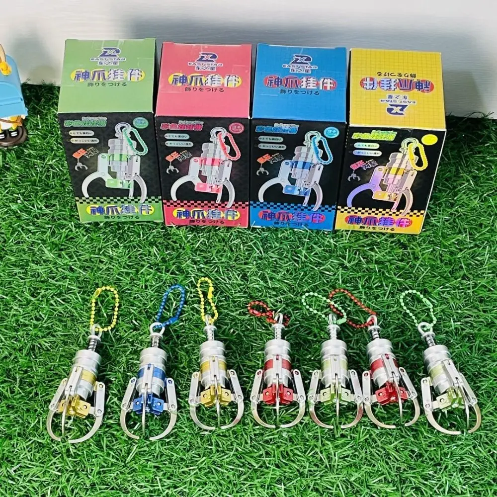 

Press Type Catch Dolls Claw Model Mini Simulation Claw Machine Key Chain Random Color Spring Grasping Claws Key Chain Boys Girls