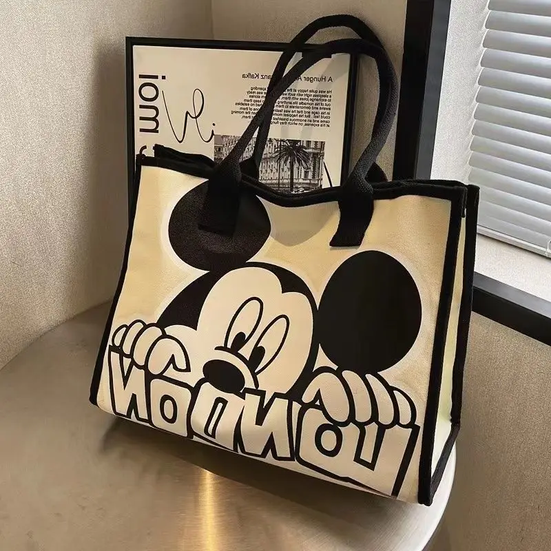 

Disney 2025 New Cartoon Mickey and Minnie Canvas Shoulder Bag Commuter Fashion Tote Bag Large Capacity Handbag Mommy Bag