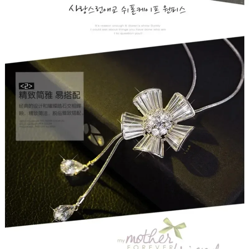 

The plum blossom sweater chain is a long zircon necklace for women, a fashionable clothing necklace, and a retro necklace