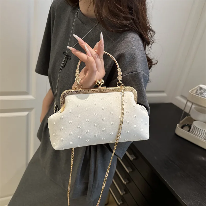 

2025 Summer New Canvas Fashion Banquet Simple Lock Foreign Style Chain Shoulder Crossbody Shell Portable Women's Bag