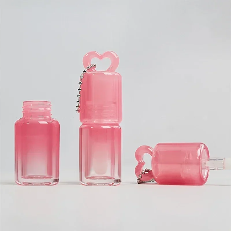 Herzform, hohl, Farbverlauf, Lipgloss-Röhren, großer Zauberstab, Pinsel, Lippenöl-Flaschen, leere Lipgloss-Röhre, Lippenstift-Flaschen, Behälter