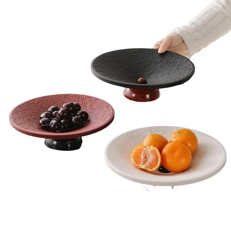Plateau à fruits texturé minimaliste sur piétement, base stable, design élégant, parfait pour servir des fruits, des collations et des desserts sur la table basse à la maison.