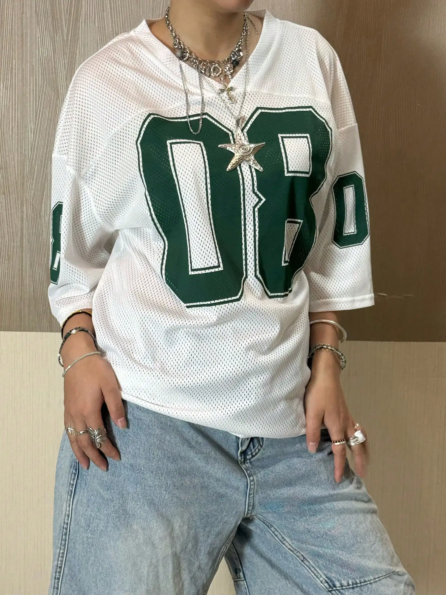 

Oversized Mesh V-Neck Graphic Tee with Bold Number Print - Streetwear Style