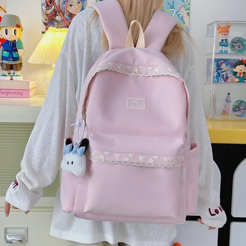 

Sweet candy-colored student backpack with lace edges, lightweight nylon fabric, large-capacity travel backpack