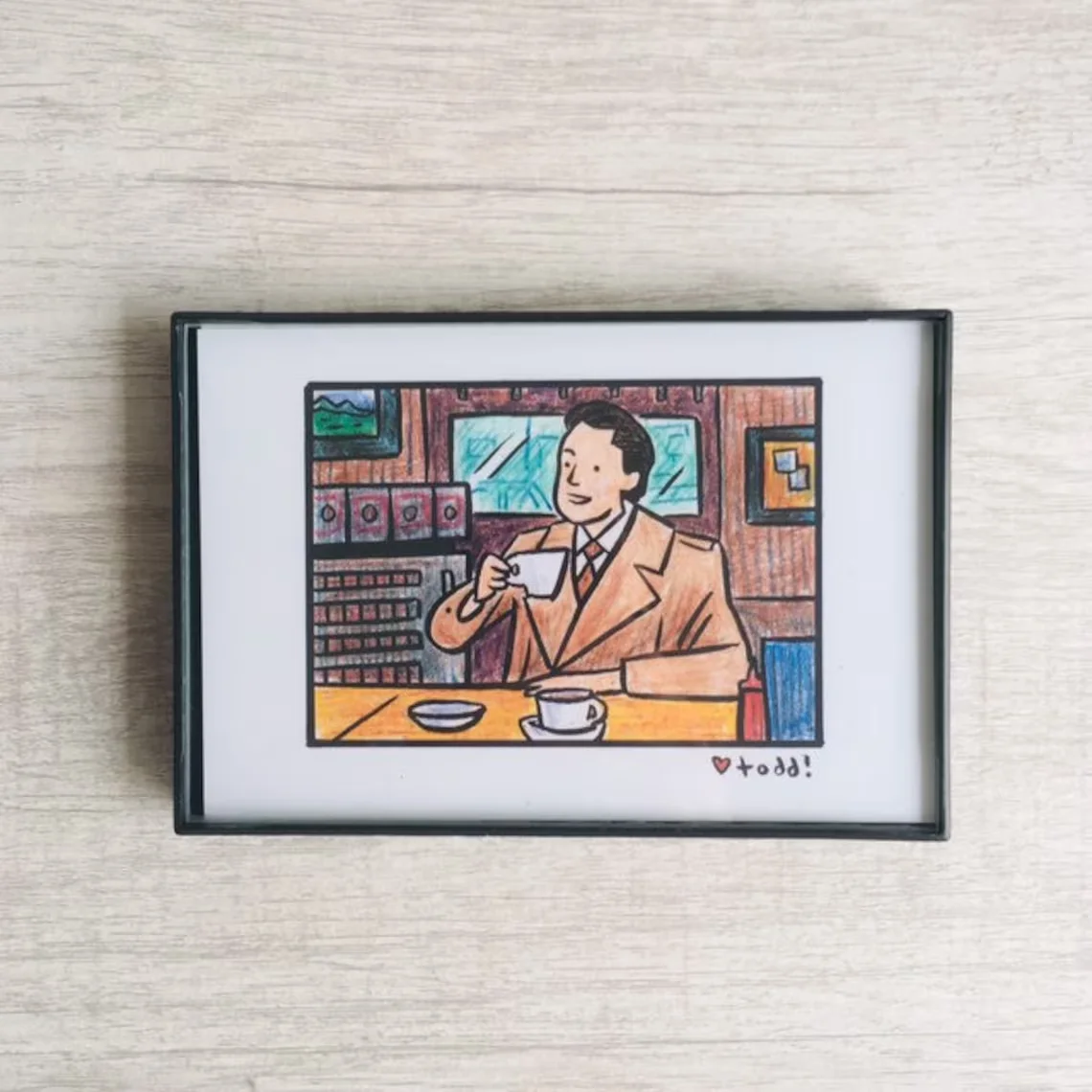 “Vintage-Style Hand-Drawn Illustration Art Print - Charming Man Enjoying Coffee in a Cozy Café Scene | Whimsical Retro Wall Deco