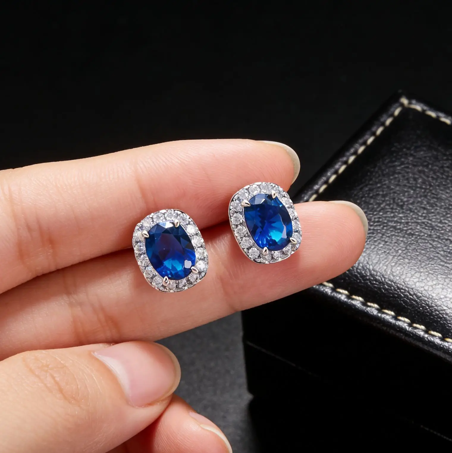 Fashionable earrings - realistic oval ruby and emerald stud earrings, simple and fashionable. Cultured sapphire stud earrings.