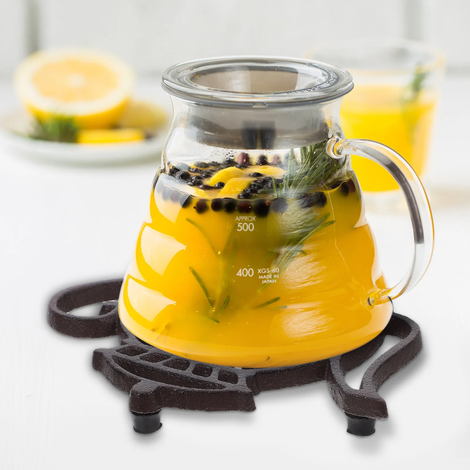 

Decorative Cast Iron Kitchen Trivet Teapot Shaped Heat Resistant Metal Pot Holder Tabletop Anti-Scald Pad Household