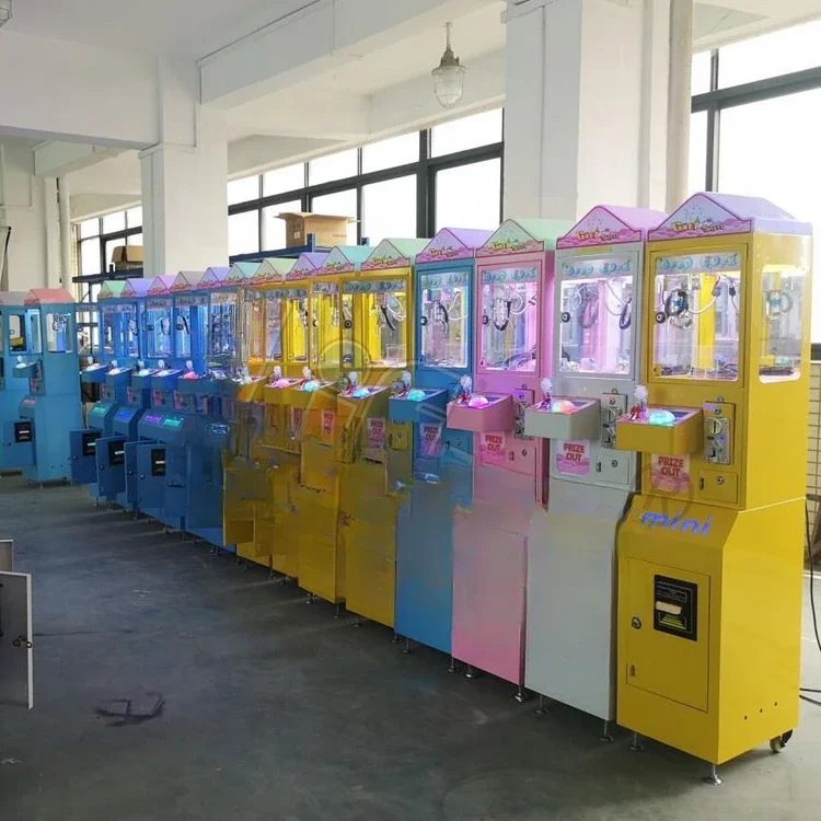 

#Coin operated candy arcade games cheap mini claw machine small toy claw crane.