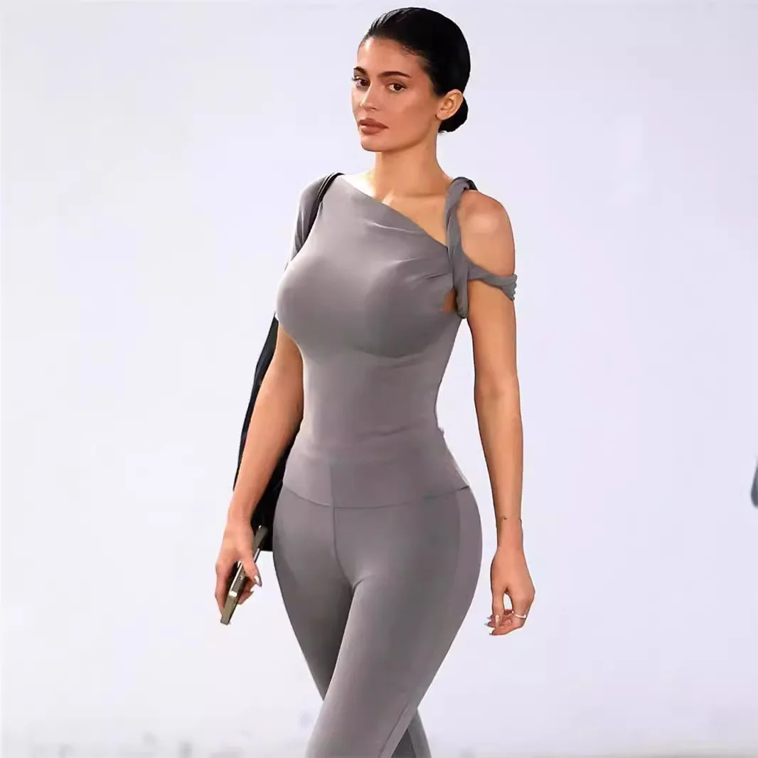 Kylie novedad de verano ropa de mujer Color sólido Casual Sexy hombro inclinado cómodo mono ajustado Top