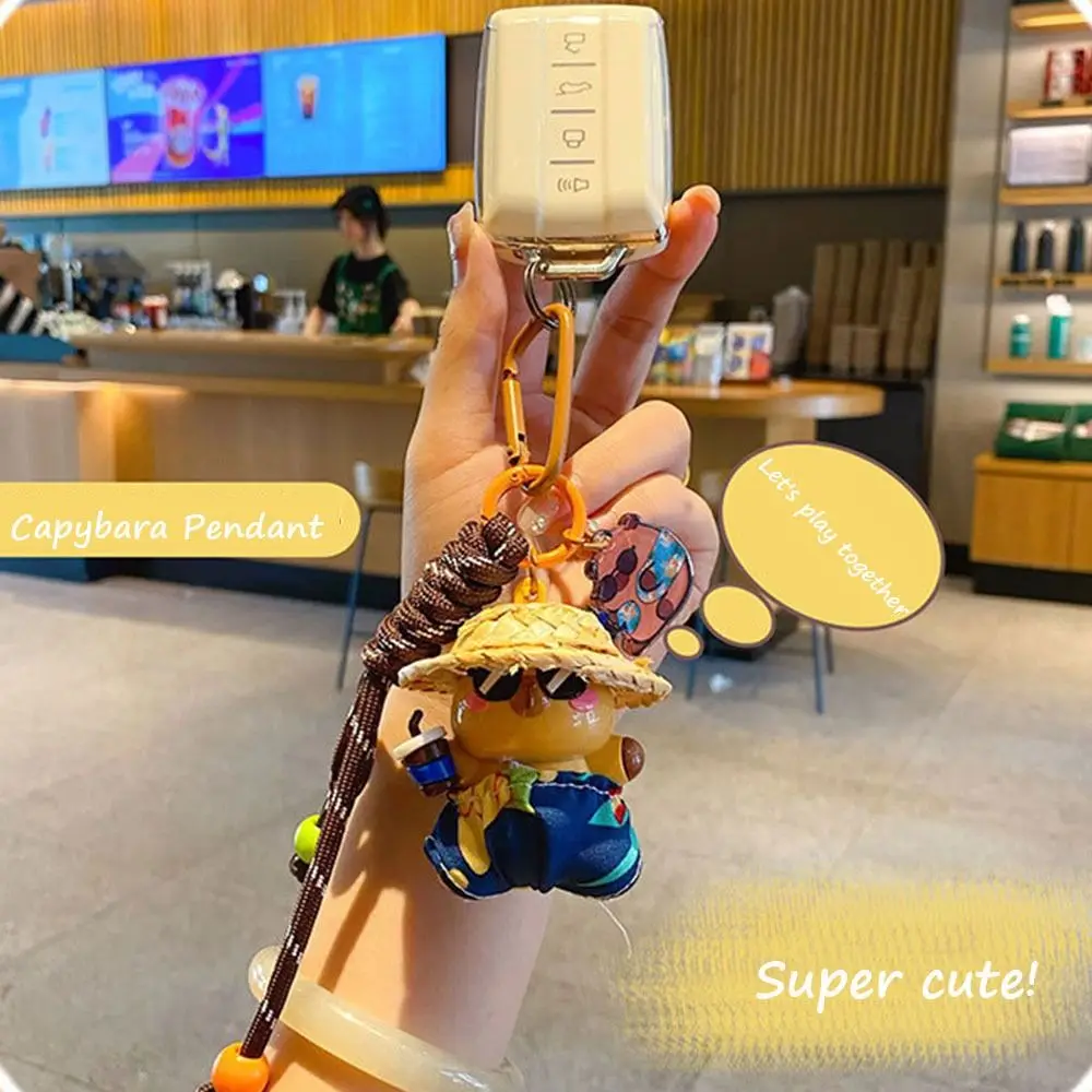 

Kawaii Cartoon Animal Straw Hat Capybara Keychain Cute Capibara Car Key Ring PVC Creative Bag Pendant Small Gifts