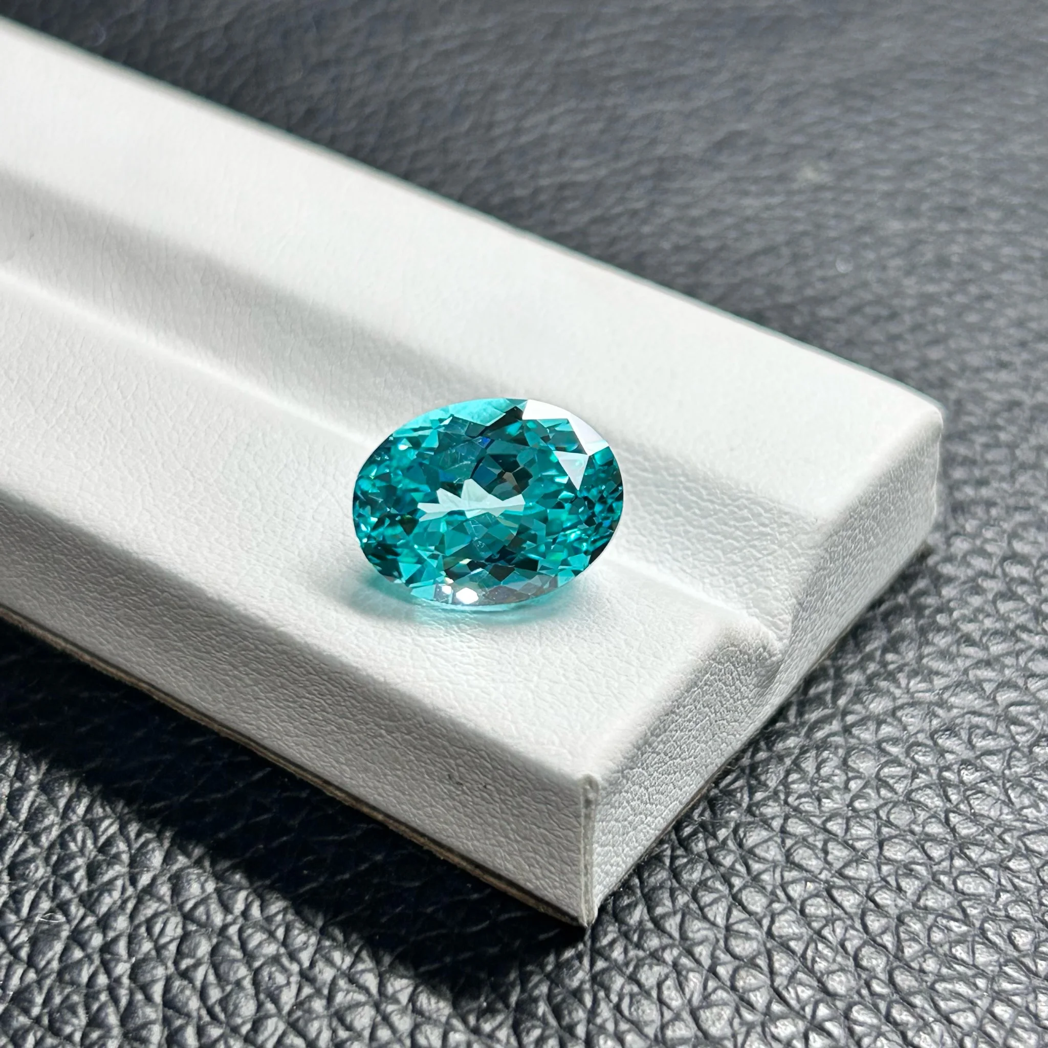 

High Quality Oval Cut Lab Grown Paraiba Gemstone Neon Sapphire Synthetic Loose Gemstone AGL Certified