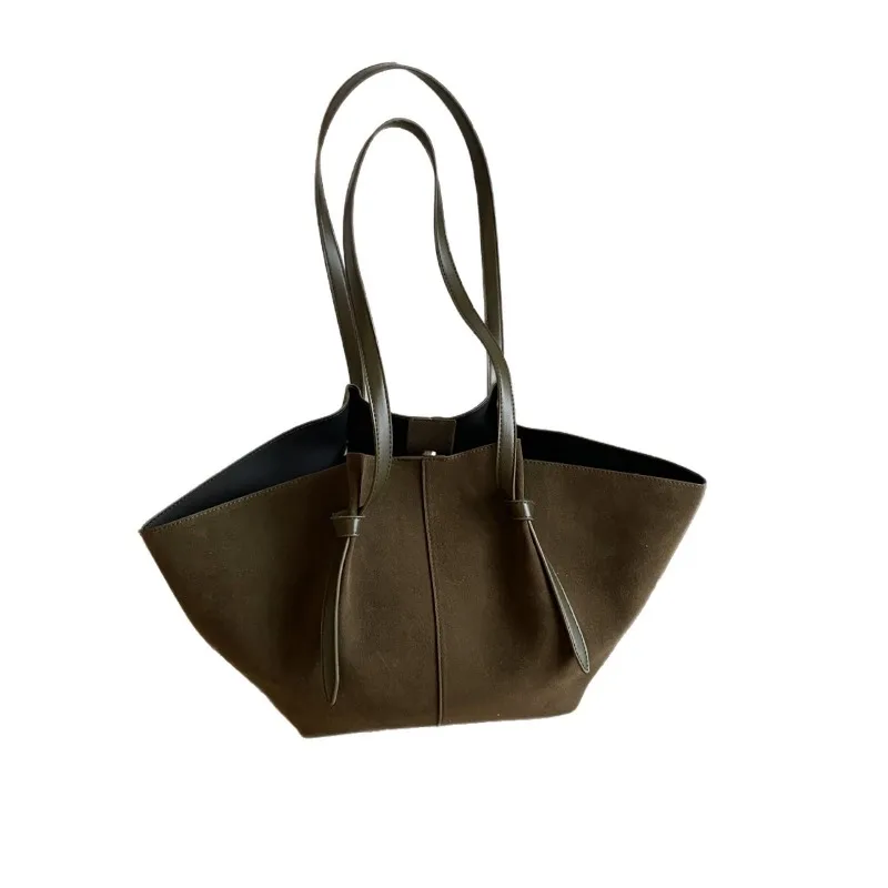 Tas tote baru yang populer tahun ini dengan desain unik, tas wanita simpel berlubang, tekstur untuk aktivitas sehari-hari bagi wanita