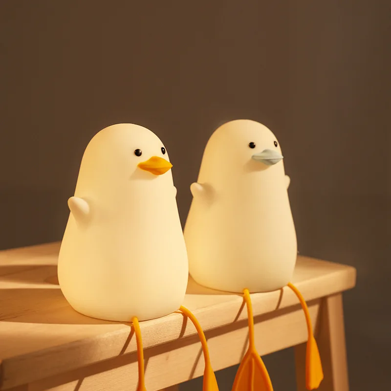 

Cross-border gull duck nightlight lying duck silicone pat lamp light in the bedroom timing table lamp charging atmosphere lamp