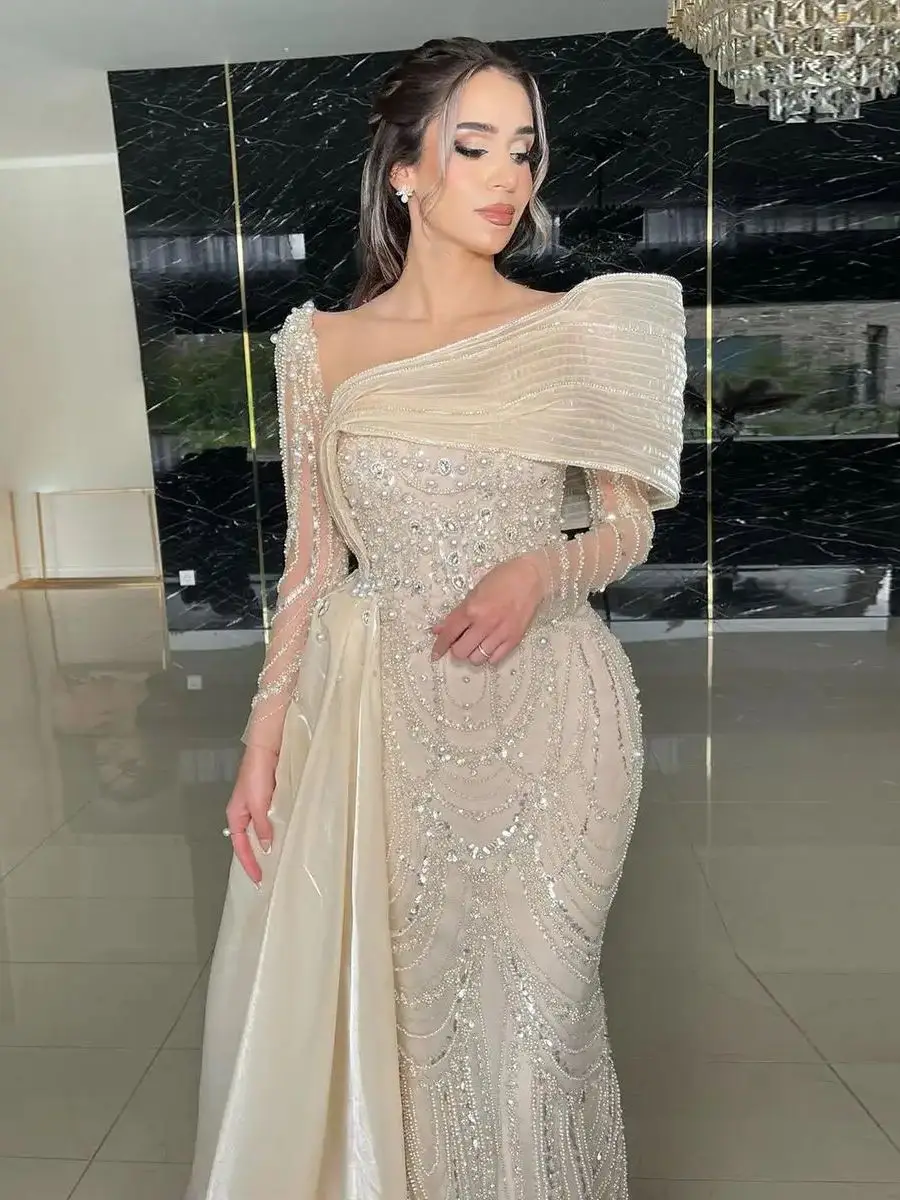 Saudi-Arabien Luxus-Abendkleider aus Jersey, Meerjungfrau-/Trompeten-Stil, Promi-Kleid, elfenbeinfarben, schulterfrei, mit Perlen verziert, langes Ballkleid