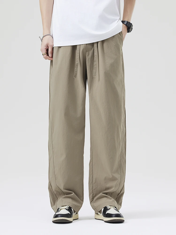 

UKTK мужские повседневные брюки, новые летние свободные эластичные прямые брюки, тонкие простые спортивные брюки Qui Dry, молодежный модный тренд, бренд