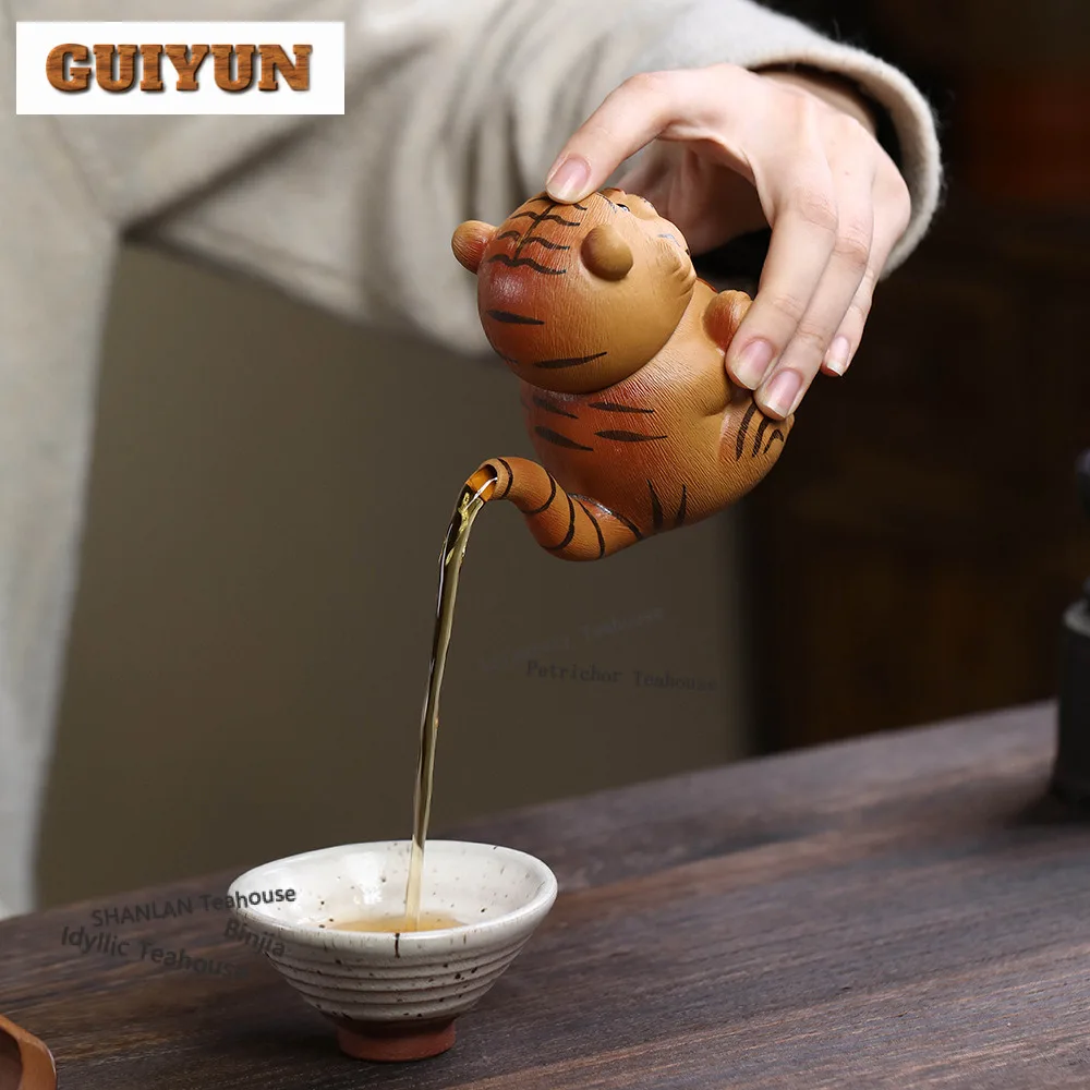90ml Creative Yixing Purple Clay Teapots Handmade Tiger Hand Grab Pot Raw Ore Downhill Mud Kettle Chinese Zisha Tea Set Craft
