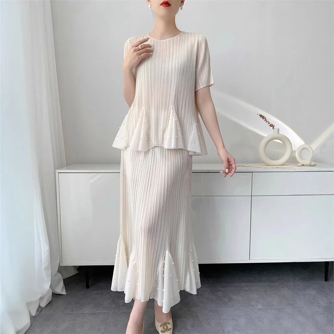 

Miyake Foreign-style Ageing Set Dress 2025 Summer New Ruffles Big Hem Fashionable Top + Pleated Half-body Fishtail Skirt Set