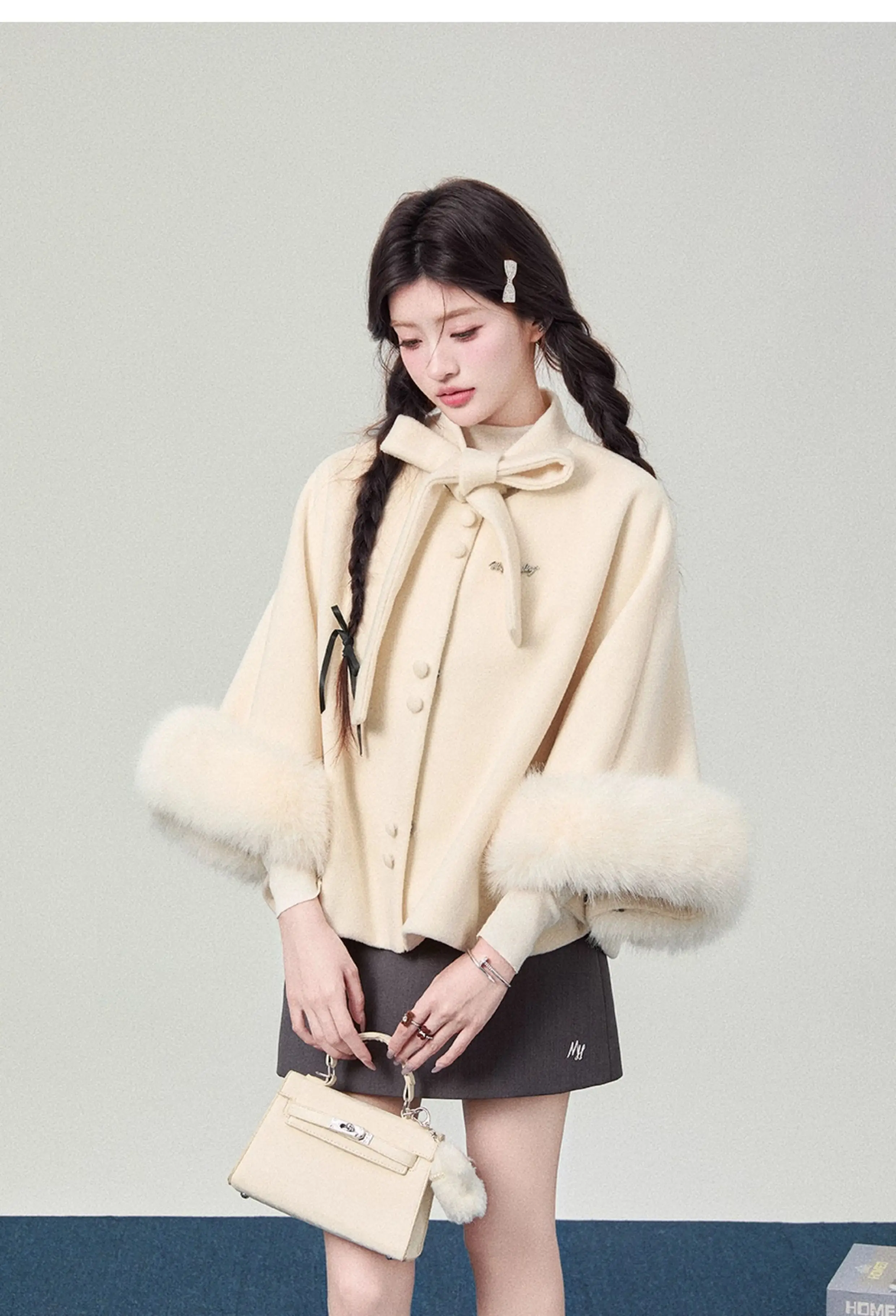 2025 Otoño Invierno nuevo estilo universitario de gama alta de las mujeres peludas blanco Floral gris negro suelto con cordones capa abrigo