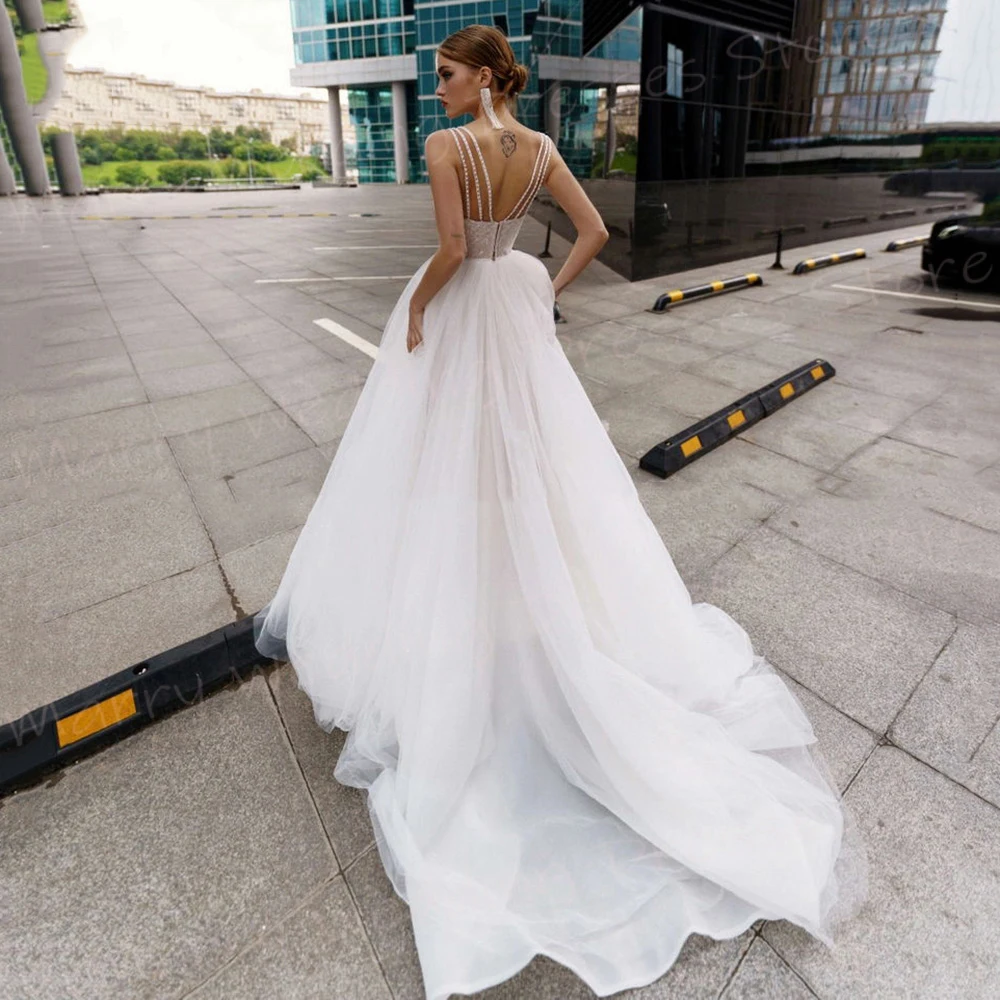 Boho gaun pernikahan wanita model A Line, gaun pengantin tali Spaghetti menawan, gaun pengantin tanpa lengan Modern Backless