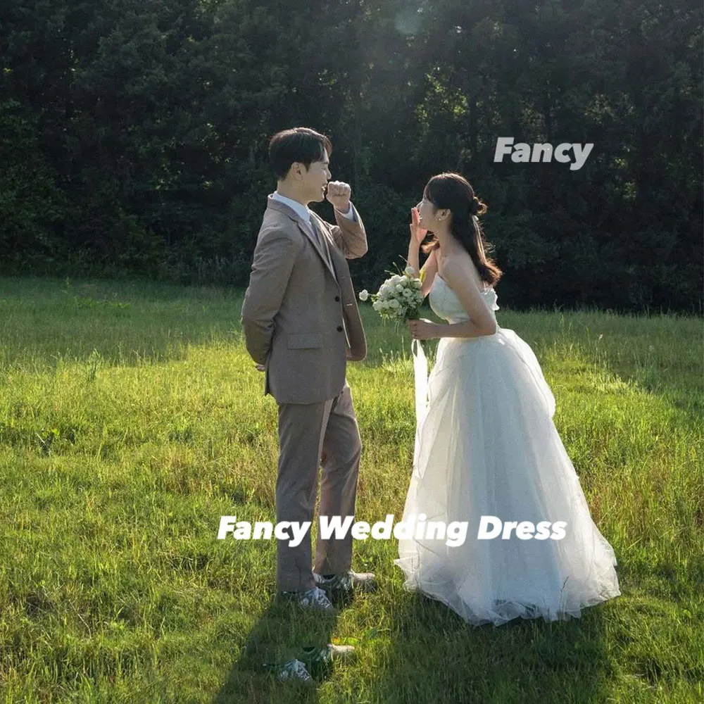 ชุดแต่งงานทรงเอไลน์แบบเรียบง่ายแฟนซีผ้าทูลนุ่มเกาหลีถ่ายภาพชุดเจ้าสาวคอร์เซ็ทด้านหลังแขนกุด 웨딩드레ส กำหนดเอง